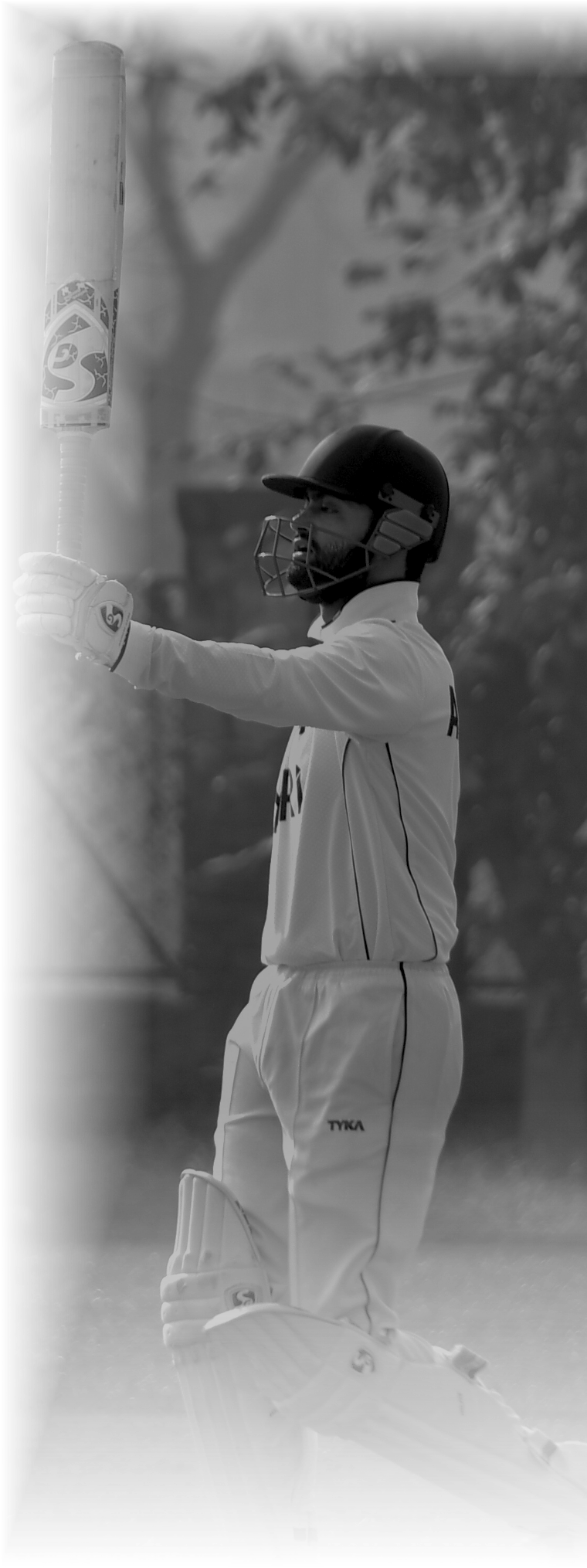 Mohit Arjwani raising his bat